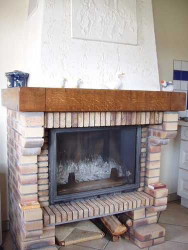 Fireplace in the kitchen of Gite en Alsace cottage